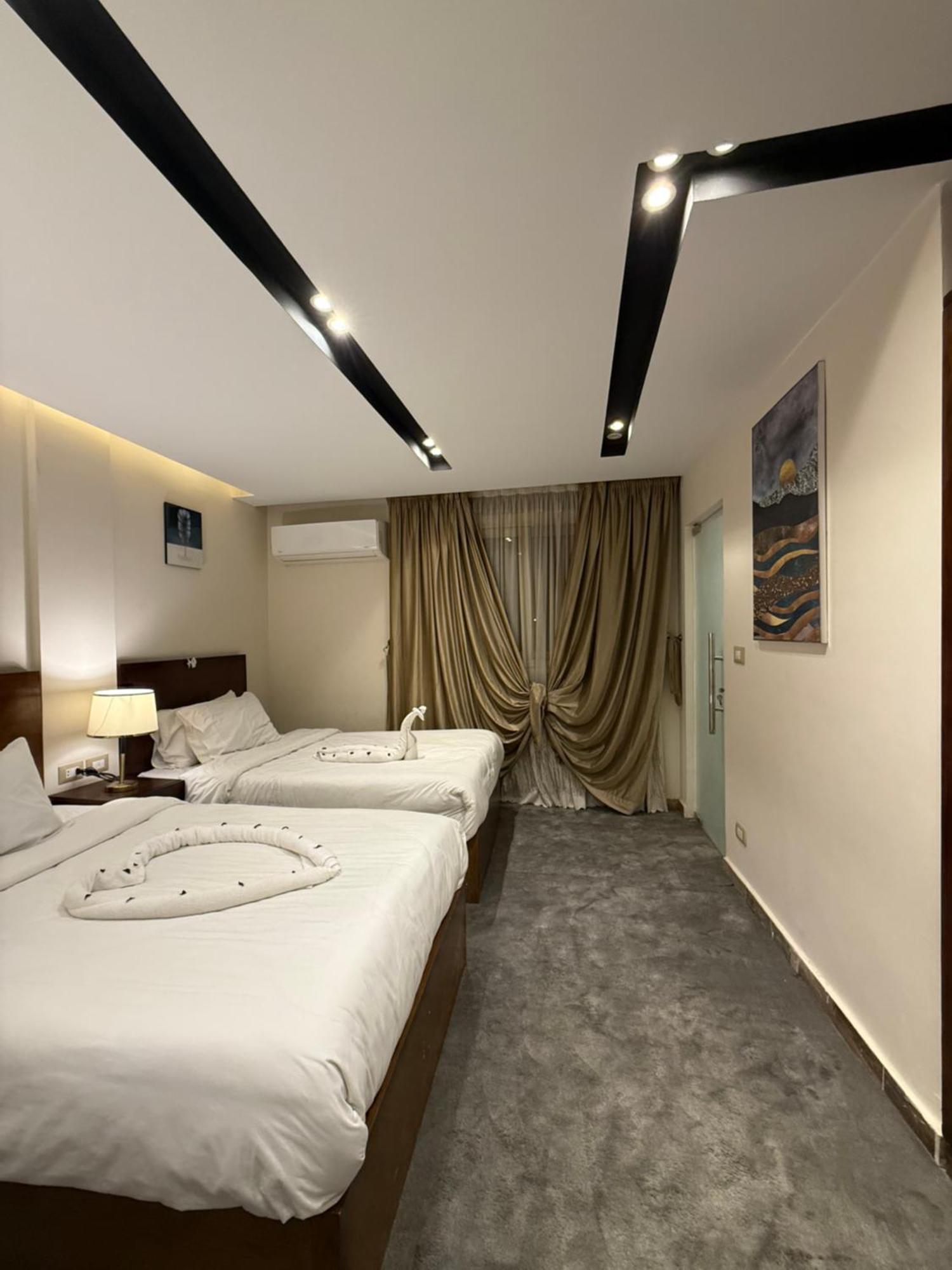 Topaz Pyramids View Inn Kafret el-Gabal Екстериор снимка