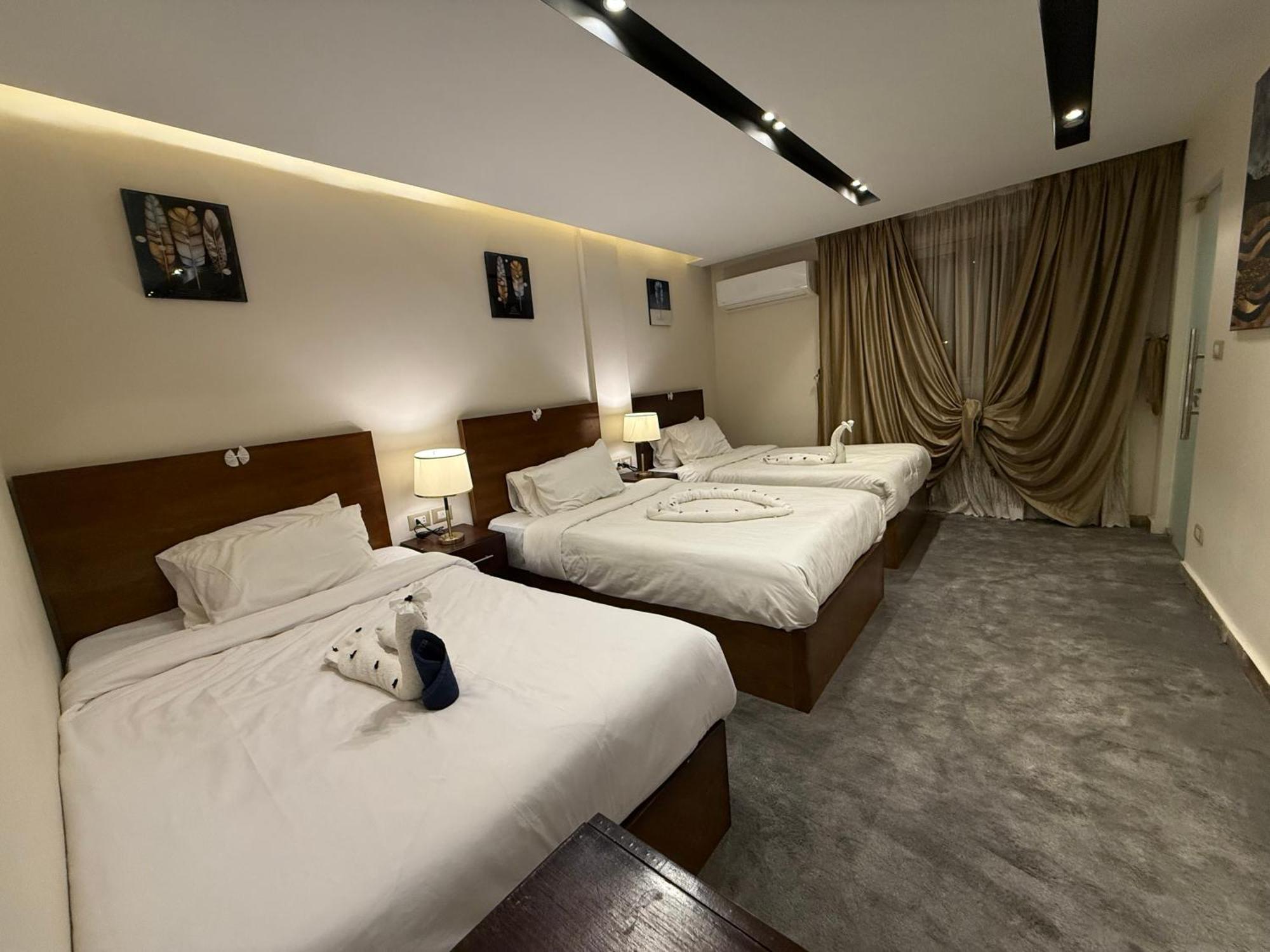 Topaz Pyramids View Inn Kafret el-Gabal Екстериор снимка