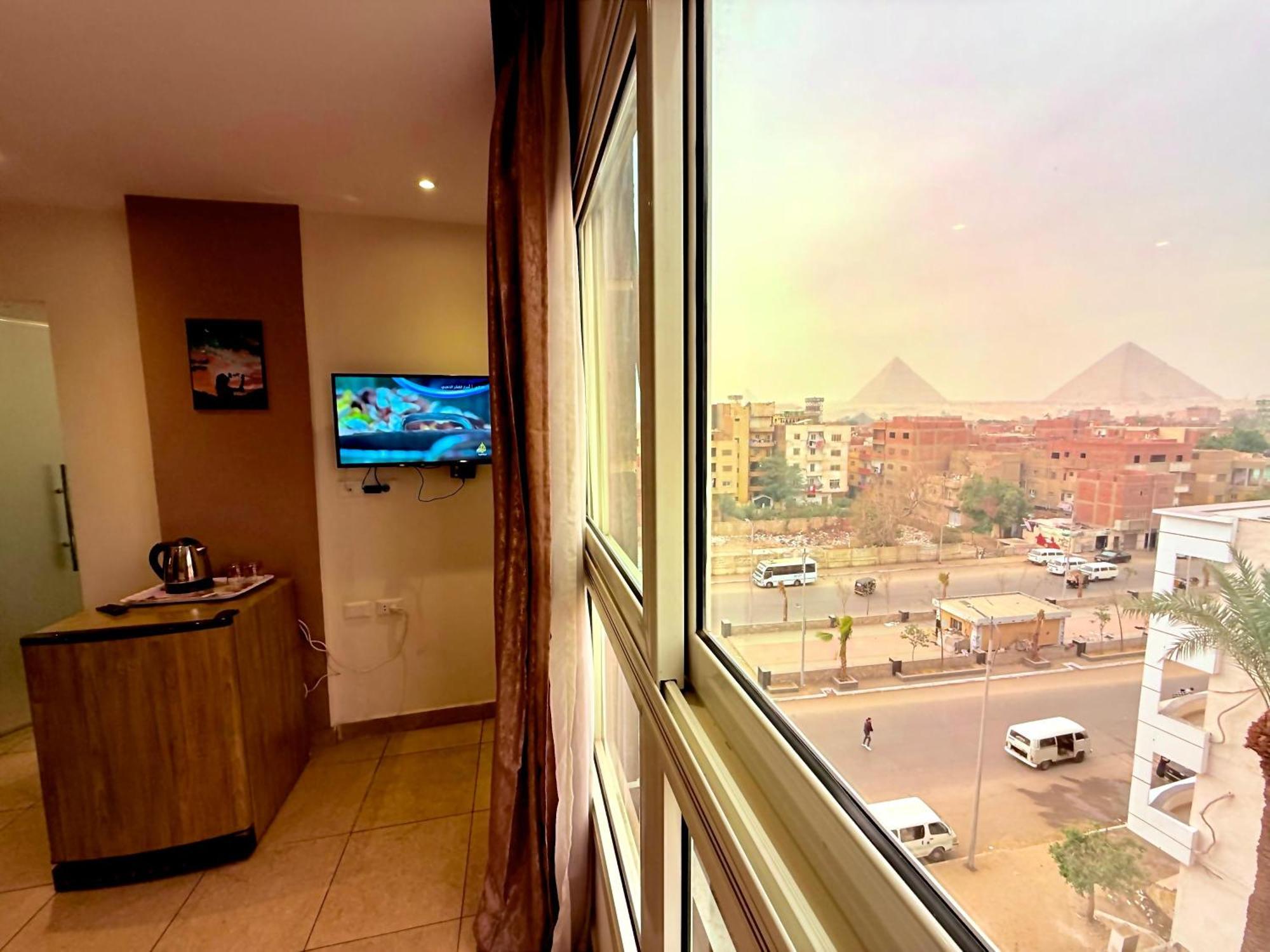 Topaz Pyramids View Inn Kafret el-Gabal Екстериор снимка